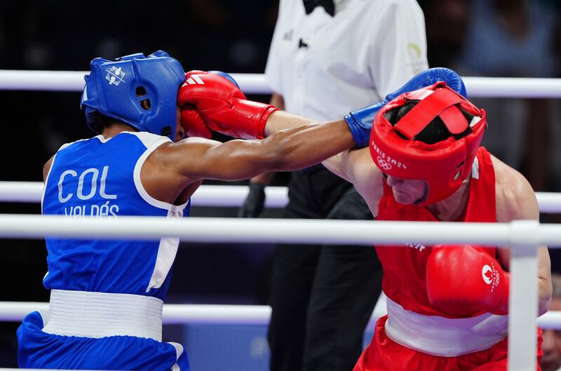 Kellie Harrington lands a right against Colombia's Angie Paola Valdes during the women's 60kg quarter-final. Photograph: Peter Byrne/PA Wire