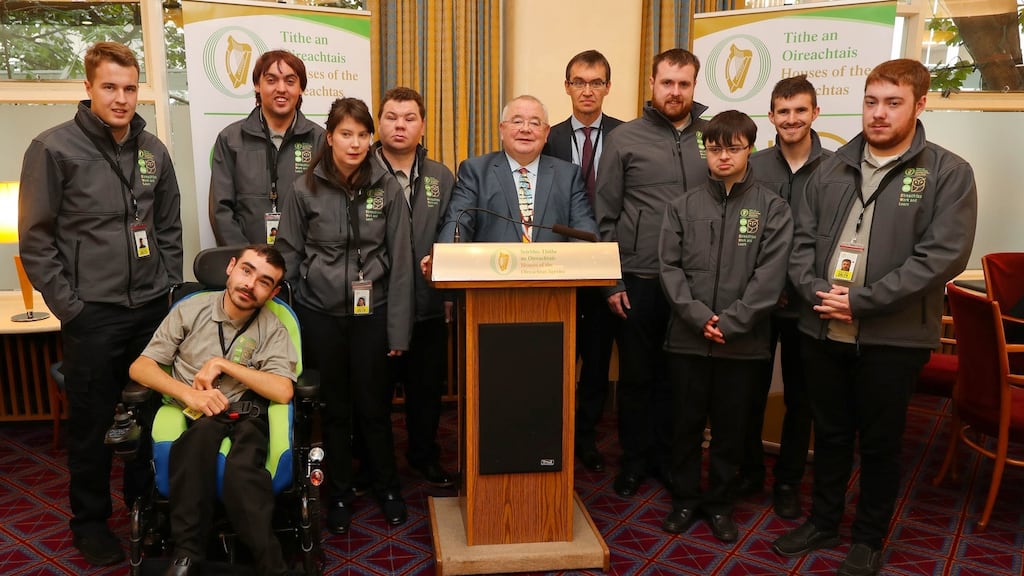 Ceann Comhairle Seán Ó Fearghaíl  with Peter Finnegan, Clerk of Dail Éireann, and interns from the Oireachtas Work and Learn (OWL) Programme. Photograph: Maxwells