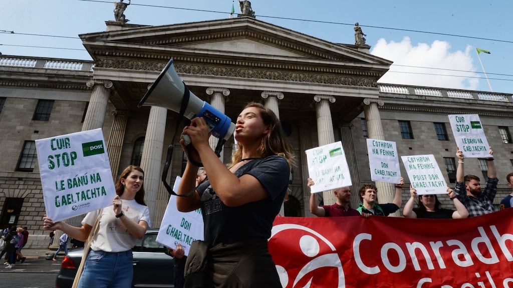 Conradh na Gaeilge protesting outside the GPO in August to ensure An Post will not end services through Irish in Gaeltacht areas as part of the current redundancy process. Photograph: Alan Betson
