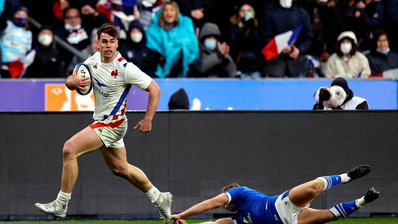 Damian Penaud crosses to score France’s fourth try against Italy. Photograph: Ryan Byrne/Inpho