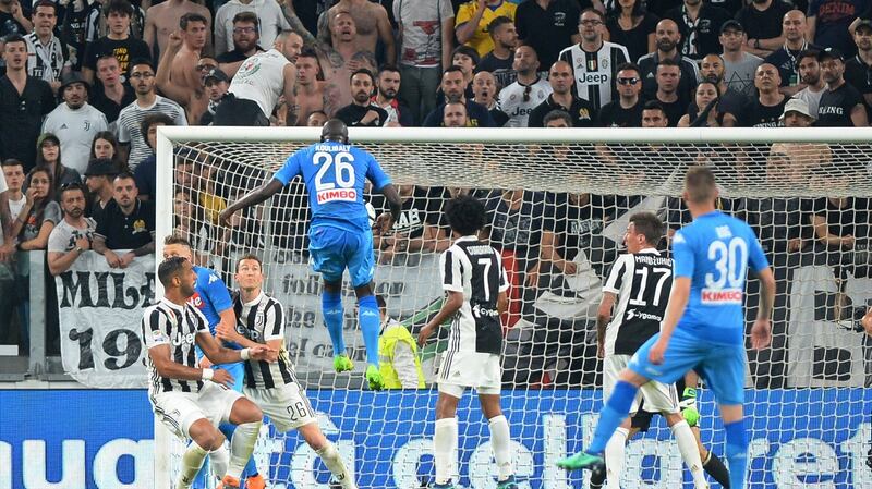 Napoli’s Kalidou Koulibaly scores the winning goal against Juventus in April 2018. The victory put them one point behind with four games to go. It wasn’t enough. Photograph: Massimo Pinca/Reuters