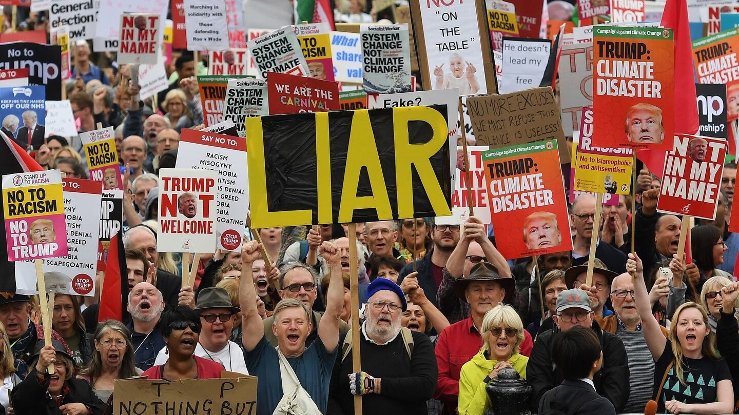 People take part in anti-Trump protest against Donald Trump State visit to the UK at Trafalgar Square. Photograph: Andy Rain/EPA