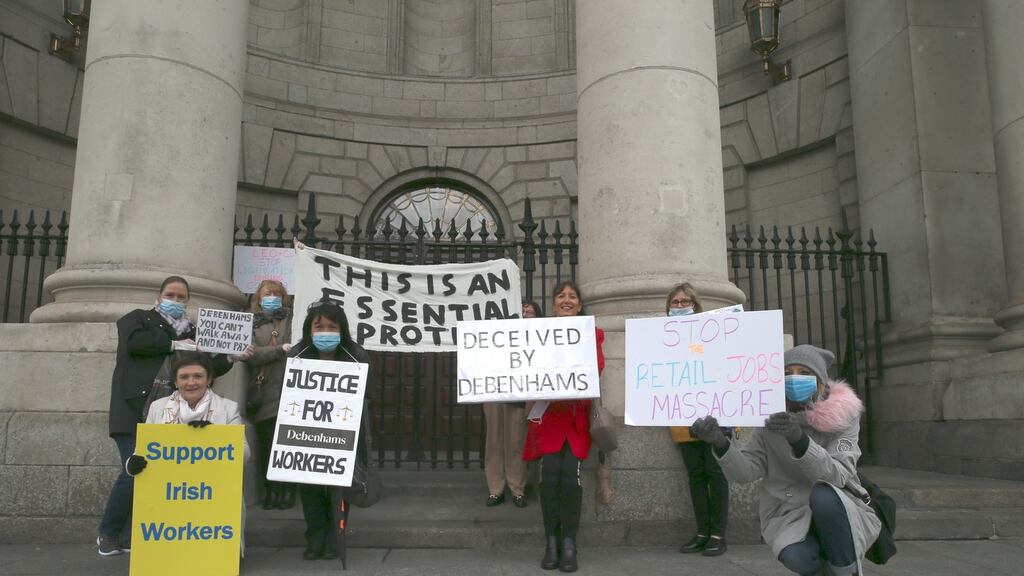 Supporters of the Debenhams workers protest at the Four Courts in Dublin