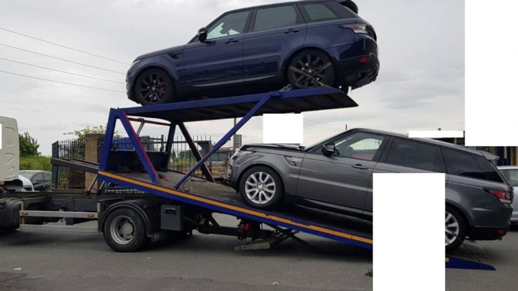 A redacted Garda photo of SUVs seized on Wednesday in west Dublin. Photograph: Garda Press Office