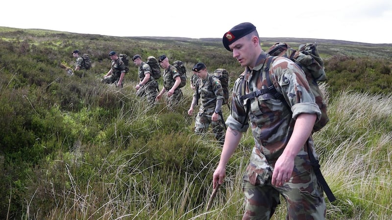 Patricia O’Connor murder case: soldiers search the Wicklow Mountains after the discovery of body parts. Photograph: Colin Keegan/Collins