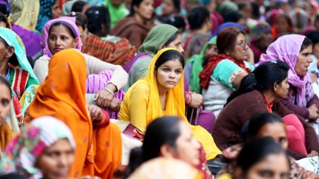 Supporters of self styled guru Sant Rampal during a protest in New Delhi, India, on Tuesday, after police tried to storm his ashram compound in Haryana state. Photograph: Money Sharma/EPA