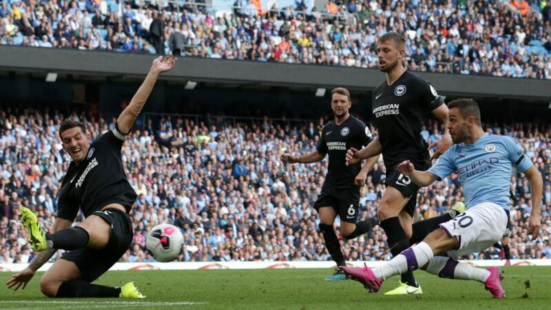 Bernardo Silva scores Manchester City’s fourth against Brighton. Photograph: Lindsey Parnaby/AFP/Getty