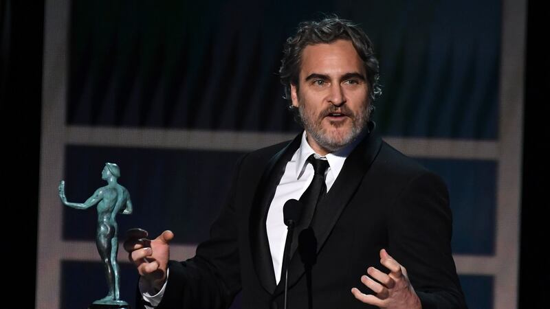 Joaquin Phoenix after winning the best actor in a leading role at the Screen Actors Guild awards in Los Angeles. Photograph: Robyn Beck/AFP/Getty Images