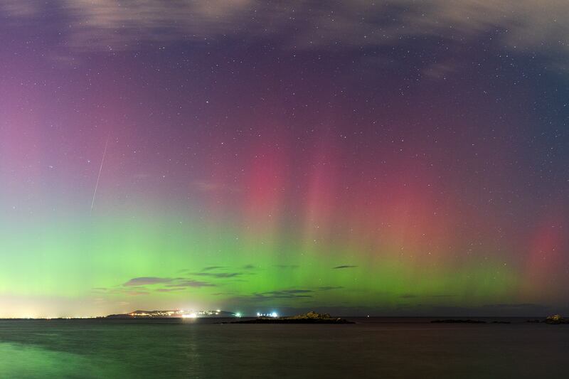 The northen lights and a shooting star above Dublin Bay. Photograph: David Costello