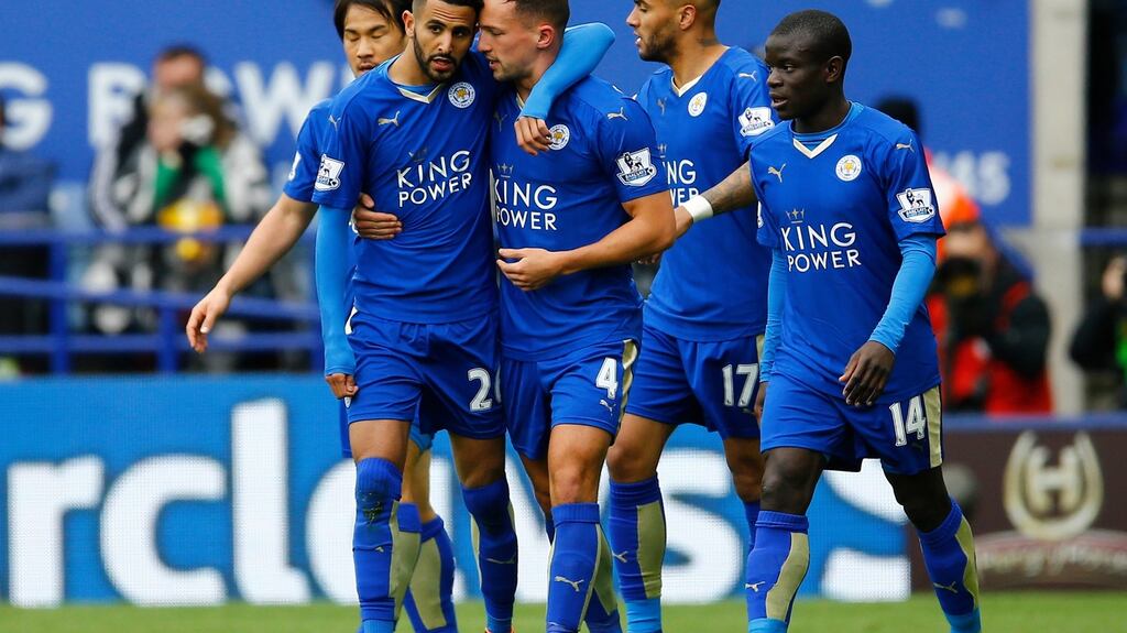 Riyad Mahrez celebrates with team mates after scoring the first goal for Leicester against Swansea City. (Photograph: Darren Staples/Reuters)