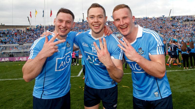 Dublin’s Philly McMahon, Dean Rock and Ciarán Kilkenny celebrate the three-in-a-row of All-Ireland titles after the victory over Mayo at Croke Park in September. Photograph: James Crombie/Inpho