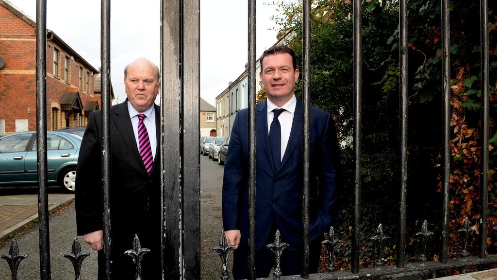 Ministers Micheal Noonan and Alan Kelly in Phibsboro earlier this week to announce the new rules governing rent. Photograph: Cyril Byrne.