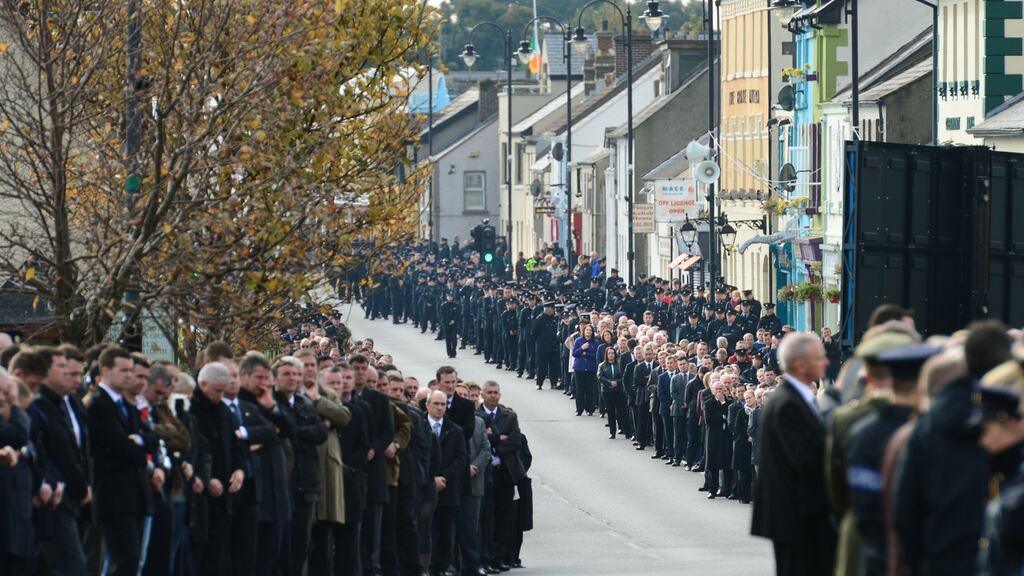 An elderly woman was wrestled to the ground after interrupting a group of men robbing her home as hundreds queued to pay respects to murdered garda Tony Golden. Photograph: Dara Mac Dónaill/The Irish Times