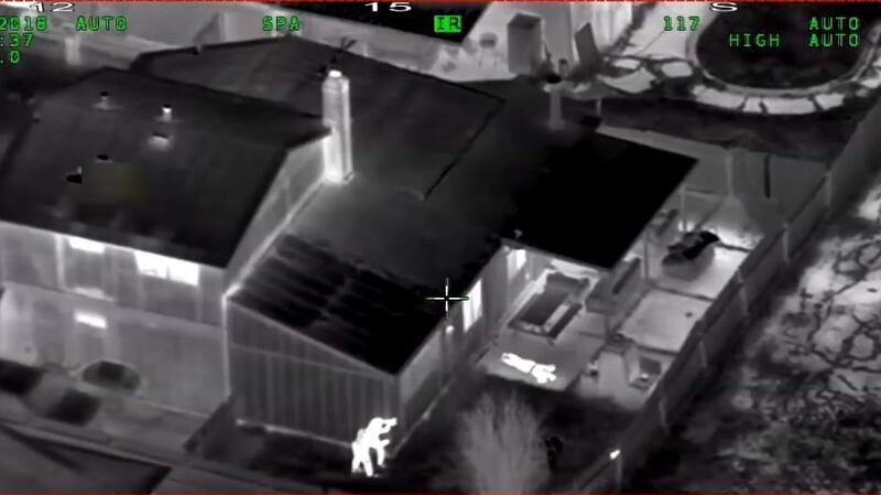 In this screen grab taken on March 30, 2018, from a helicopter police camera video released by the Sacramento Police Department, police are seen shooting at Stephon Clark (R) in the garden of his grandmother’s house: Photograph: Handout/AFP