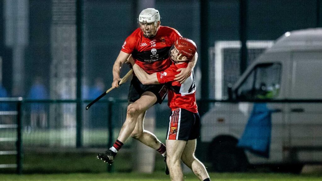 UCC’s David Griffin celebrates the final whistle with Dara Lynch in the Fitzgibbon Cup semi-final at WIT. Photograph: Morgan Treacy/Inpho