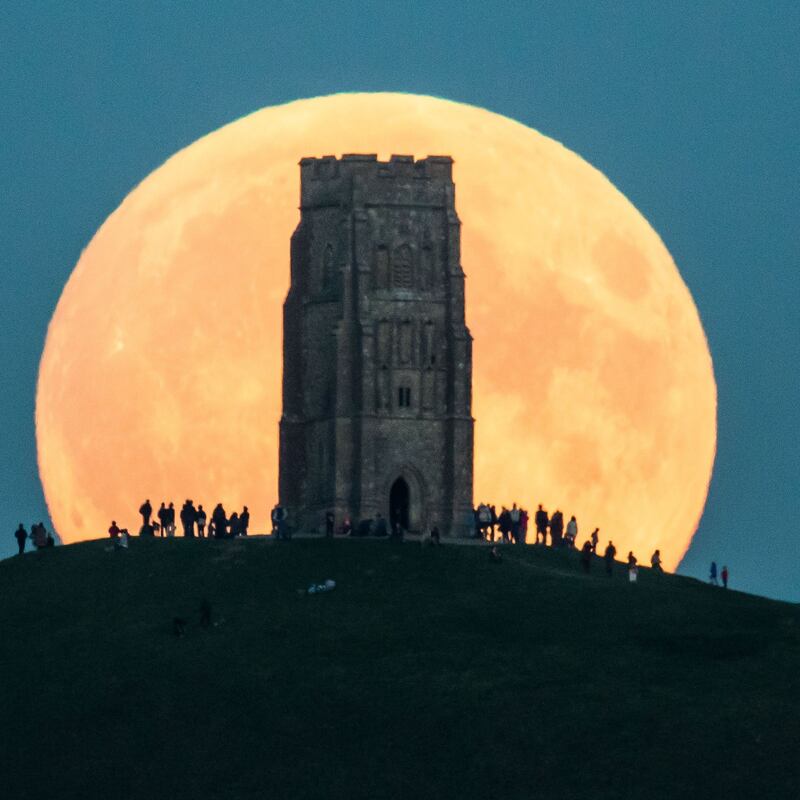 The supermoon rises behind Glastonbury Tor in England on September 27th, 2015. Photograph: Matt Cardy/Getty Images