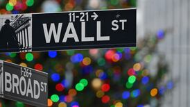 US stocks end tumultuous year at record high