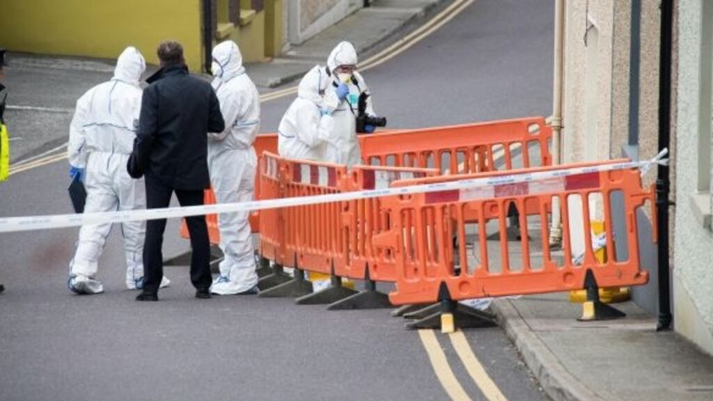 State Pathologist Marie Cassidy and Garda technical experts examine the scene in Skibbereen where John Ustic’s body was found. Photograph: Provision