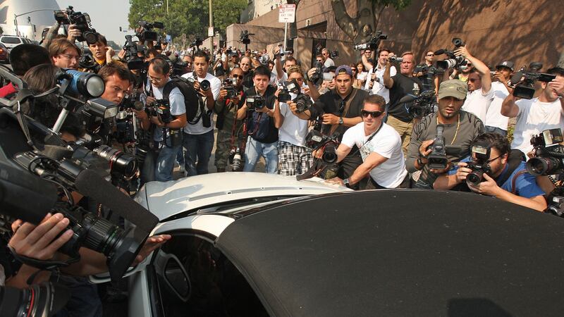 Photographers surround Britney Spears’ car as she arrives at court in 2007. Photograph: Robyn Beck/AFP/Getty