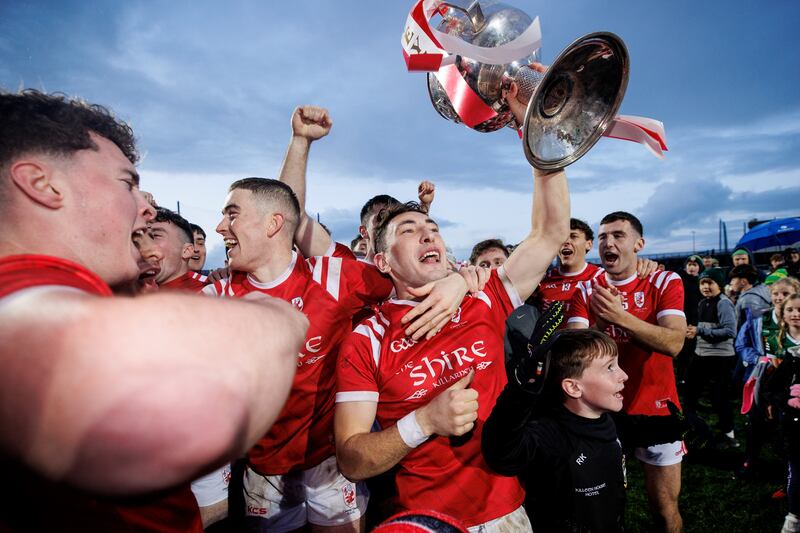East Kerry's Paudie Clifford and his teammates celebrate with the cup after the victory over Mid Kerry in the Kerry SFC final at Austin Stack Park. Photograph: Ben Brady/Inpho