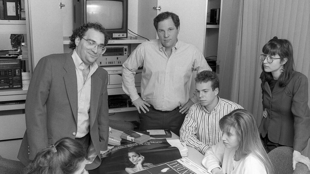 Harvey Weinstein (centre) and his brother, Bob Weinstein, at Miramax offices in New York in 1989. A new Channel 4 documentary, Working With Weinstein, focused on backroom staff. Photograph: Barbara Alper/Getty