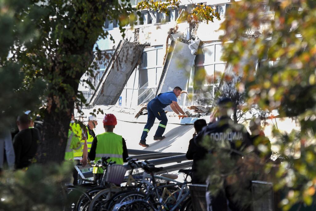 Emergency personnel and police officers work at the site where a concrete outdoor roof of a train station collapsed in the Serbian city of Novi Sad on November 1st. Photograph: Nenad Mihajlovic/AFP via Getty
