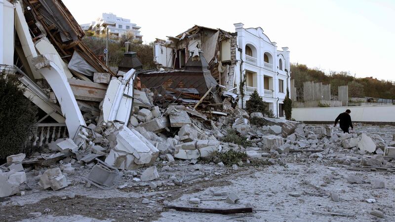 A man walks past a beach hotel destroyed in the Ukrainian city of Odesa by a Russian missile strike. Photograph: Oleksandr Gimanov/AFP via Getty Images