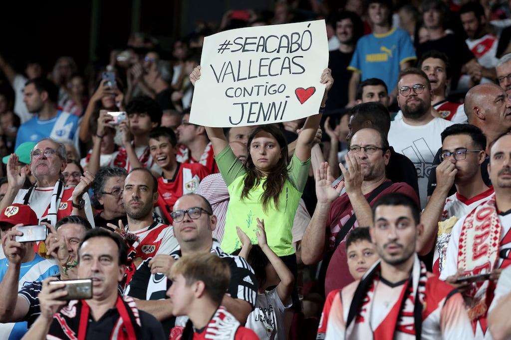 A woman holds up a sign in support of Jennifer 'Jenni' Hermoso before the match between Rayo Vallecano and Atletico Madrid in Madrid on Monday. Photograph: Thomas Coex/AFP via Getty Images