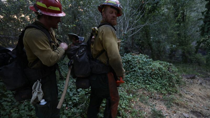 Firefighters battle a wildfire near Santa Rosa. Photograph: REUTERS/Jim Urquhart