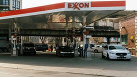 Exxon and Chevron profits slide from record highs