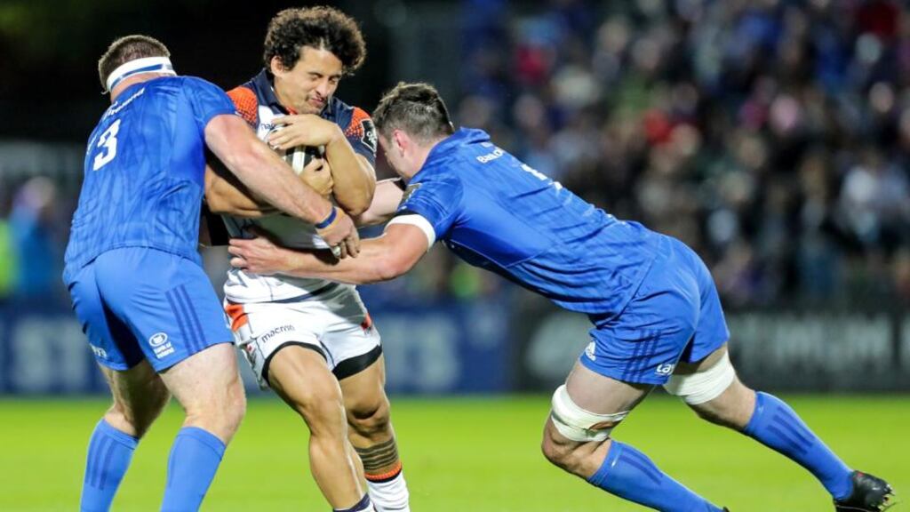Michael Bent and James Ryan of Leinster tackle Edinburgh’s Juan Pablo Socino during the Guinness Pro 14 match at the RDS. Photograph: Laszlo Geczo/ Inpho