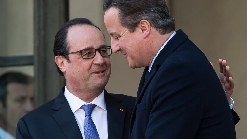 French president Francois Hollande embraces British prime minister David Cameron after a meeting at the Élysée Palace in Paris on Monday. Photograph: Ian Langsdon/EPA.