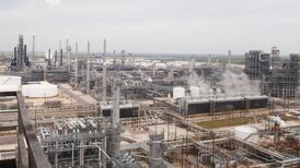 Brent holds near $112 as chance of Fed taper offsets upbeat data