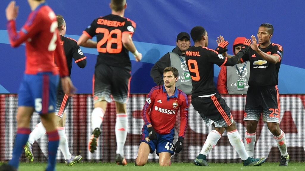 Manchester United players celebrate after Anthony Martial equalised against CSKA Moscow in their Champions League Group B encounter. Photo: Kirill Kudryadtsev