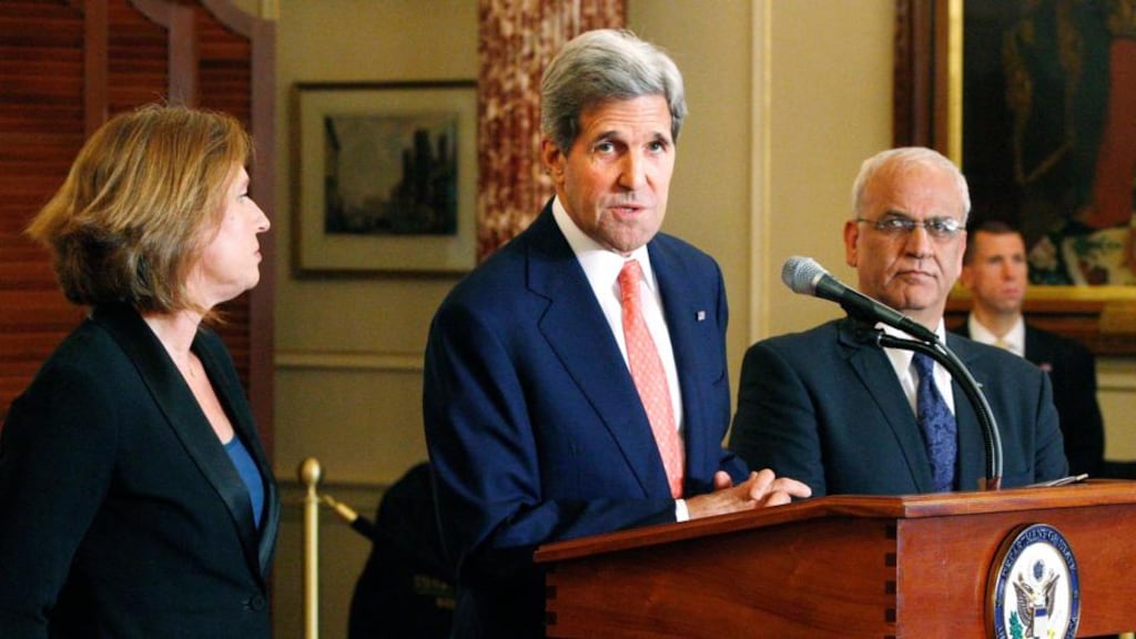 US secretary of state John Kerry (C) announces further peace talks at a news conference with Israel’s justice minister Tzipi Livni (L) and chief Palestinian negotiator Saeb Erekat (R) at the State Department in Washington today. Photograph: Jonathan Ernst/Reuters.