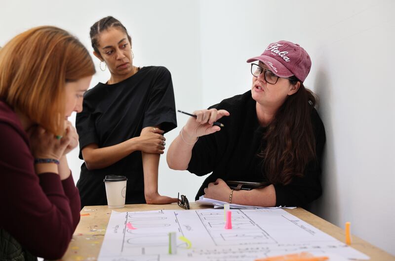 From left: Ali Keohane, Etta Fusi and Una Kavanagh during rehearsal for ANU’s All Hardest of Women. Photograph: Dara Mac Dónaill