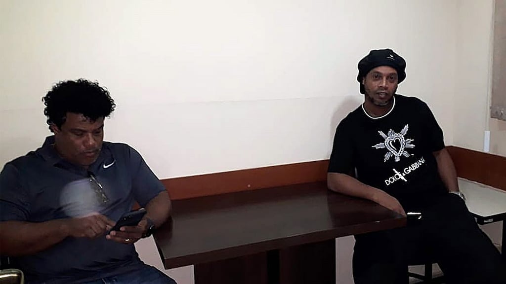 Brazilian former soccer star Ronaldinho Gaucho (R) along with his brother Roberto de Assis in the prosecutor’s office in Asuncion, Paraguay. Photograph: Paraguayan public prosecutor/EPA