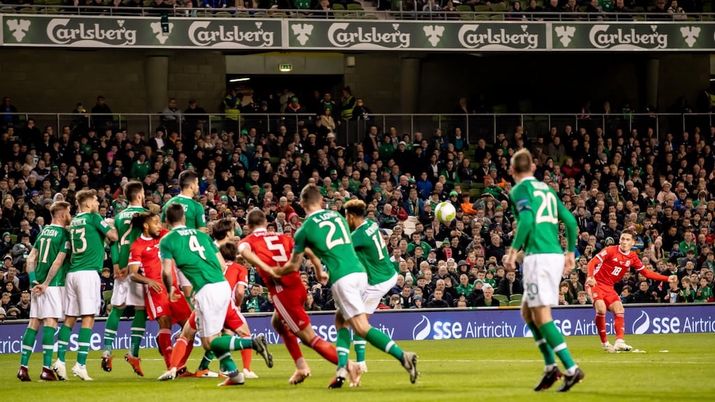 Harry Wilson fires home a free-kick to give Wales the lead in the Uefa Nations League match at the Aviva Stadium. Photograph: Morgan Treacy/Inpho