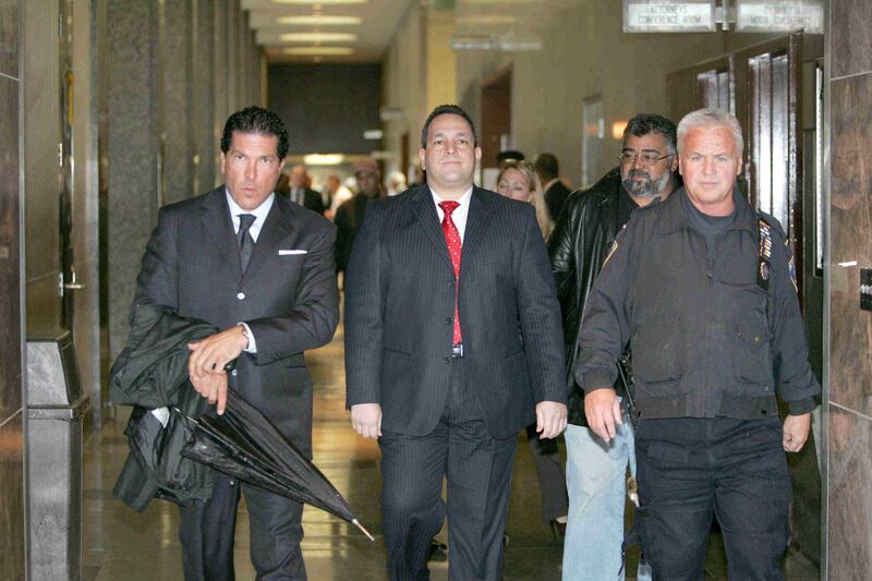 Joe Tacopina arrives in court in Queens in October 2009 with New York state senator Hiram Monserrate, who was accused of assaulting his girlfriend. Photograph: Ellis Kaplan/Getty Images