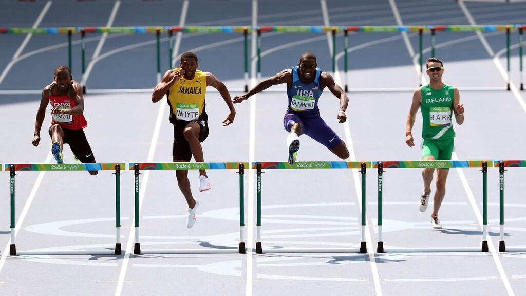 Ireland’s Thomas Barr comes home in fourth place as USA’s Kerron Clement takes gold in the men’s 400m hurdles at the Olympic Stadium. Photograph: David Davies/PA