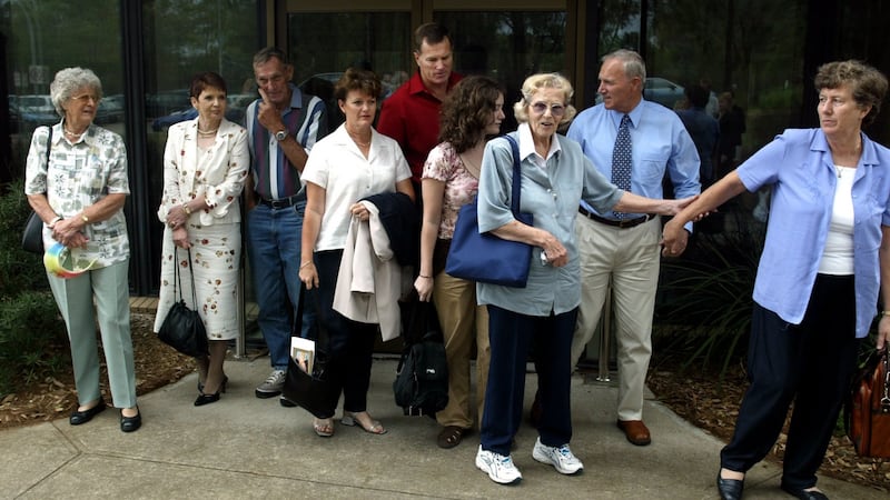 Family and friends of Lynette Dawson leave court after an inquest in Westmead, Sydney, in 2003. Photograph: Sean Davey/Fairfax Media via Getty Images