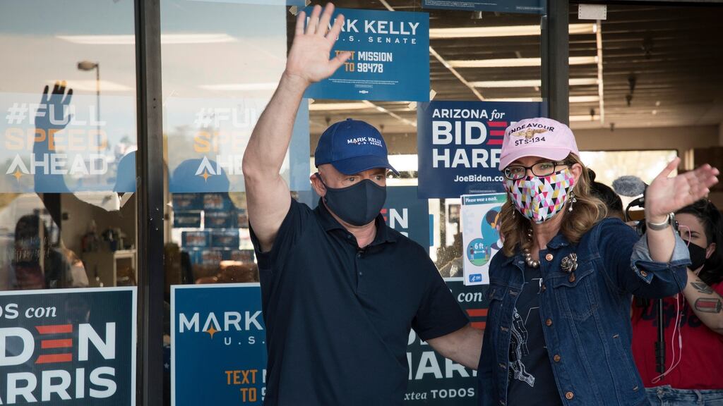 Democratic Senate candidate Mark Kelly and  his wife, former congresswoman Gaby Giffords,  in Phoenix, Arizona. Photograph: EPA/RIck D’Elia