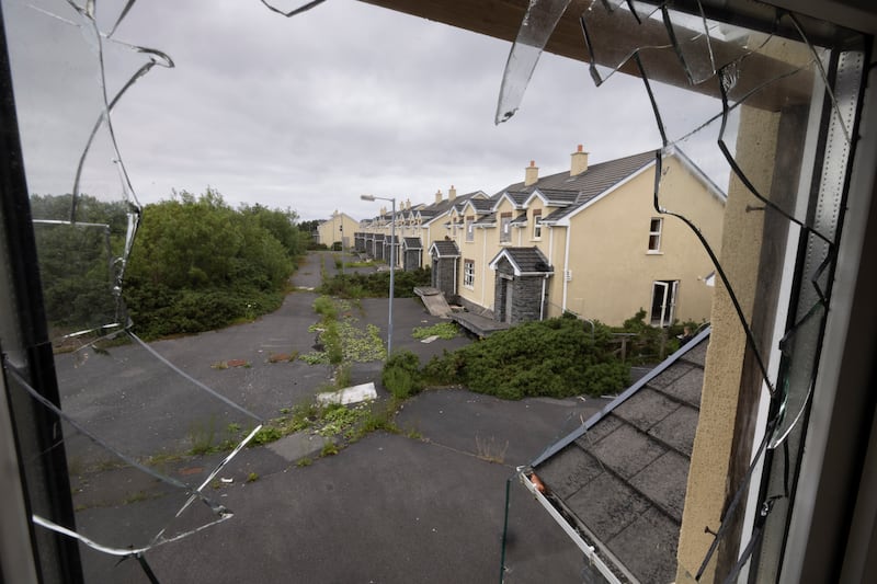 The empty Radharc An Seascan estate seen through a broken window of one of the homes in Dungloe, Co Donegal. Photograph: Joe Dunne