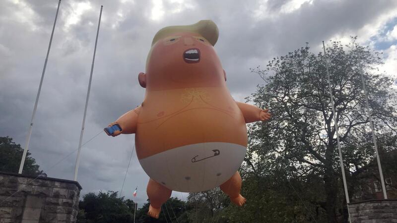 A giant inflatable blimp depicting US president Donald Trump as a pouting baby arrives in Dublin, Ireland. Photograph: Padraic Halpin/Reuters