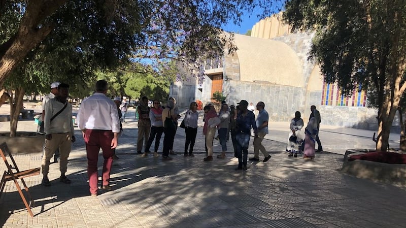Women members of the Taoiseach’s delegation wait outside St Mary’s in Axum, Ethiopia, which only allows men to enter. Photograph: Harry McGee