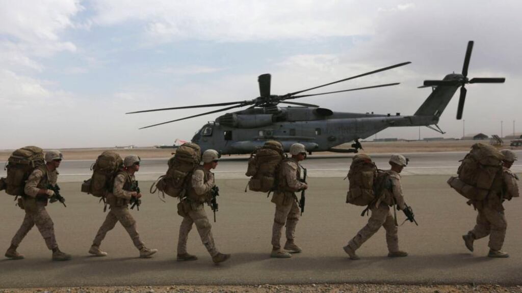 ‘The troops who left Afghanistan on Monday last after 13 years of war were told by Downing Street and the White House, the MoD and the Pentagon, that, all things considered, their efforts had been worthwhile. I suppose they can say no other.’ above, US marines preparing to depart following the end of operations for marines and British combat troops in Helmand on Monday. Photograph: /Omar Sobhani/Reuters
