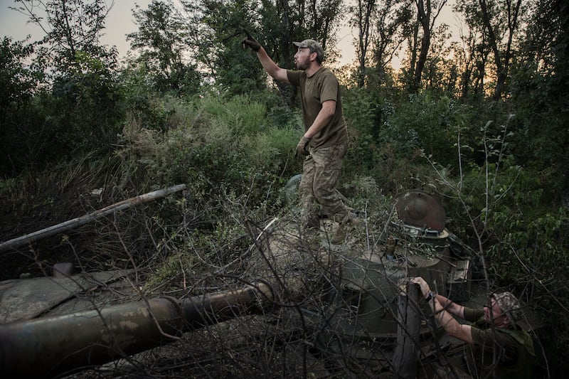 A Ukrainian soldier watching overhead for a drone in the Bakhmut region of Ukraine in recent days. Photograph: Tyler Hicks/New York Times