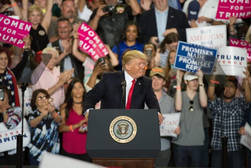 Donald Trump looks on during his speech at the Pennsylvania Farm Show Complex in Harrisburg, Pennsylvania last night.