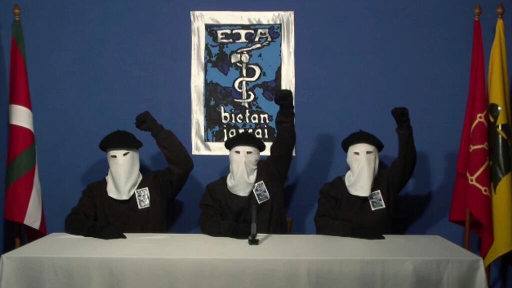 Masked members of the Basque separatist group Eta hold up their fists in unison in this 2011 file photograph taken at an unknown location. Photograph: AP Photo/Gara via AP