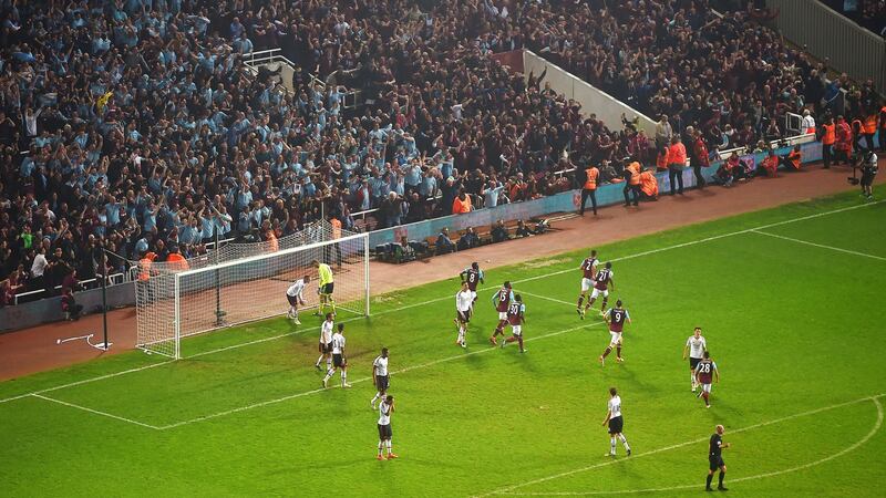 Winston Reid and his West Ham team-mates celebrate as the Upton park crowd go crazy in their final Premier League game at the ground against Manchester United. Photograph: Michael Regan/Getty Images